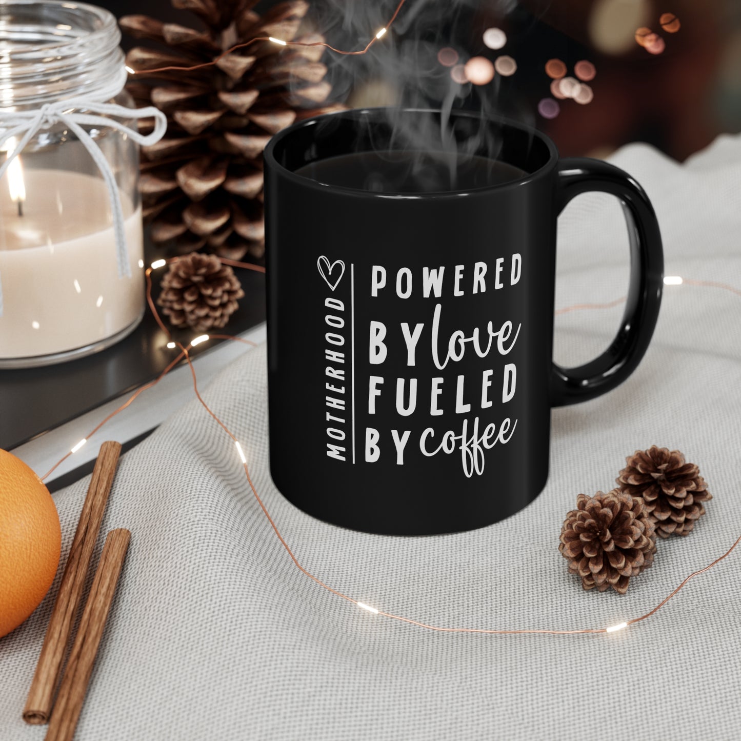 Powered by love 11oz Black Mug