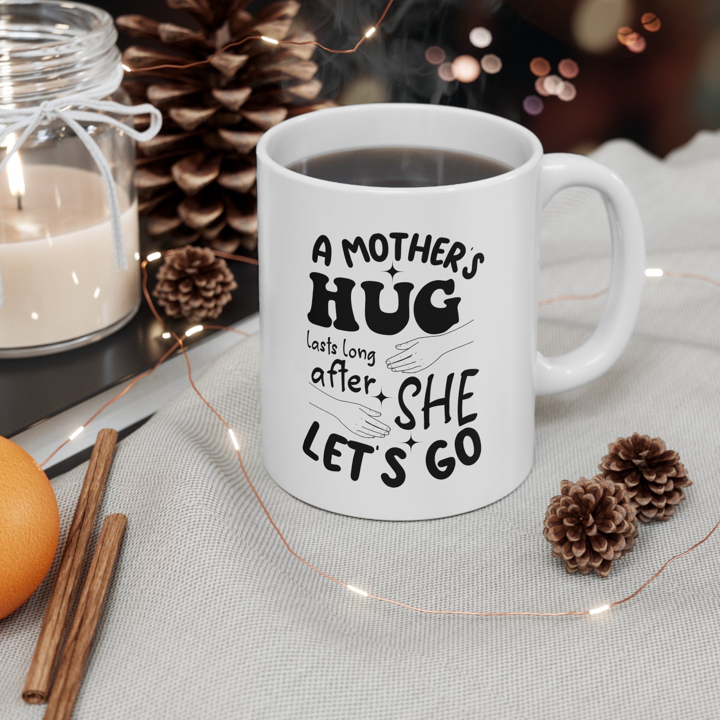 A Mothers hug lasts long after she 11oz white mug